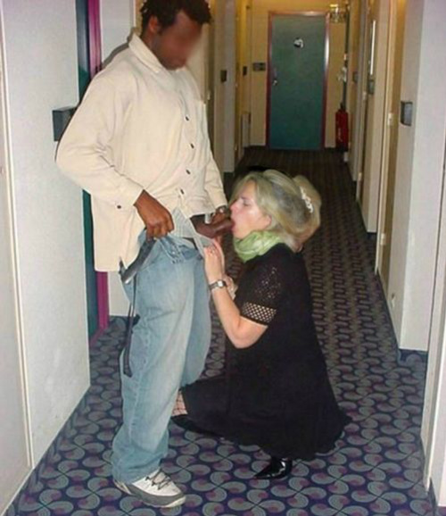 Blonde Bends Over to Suck Black in Hot Interracial Photo